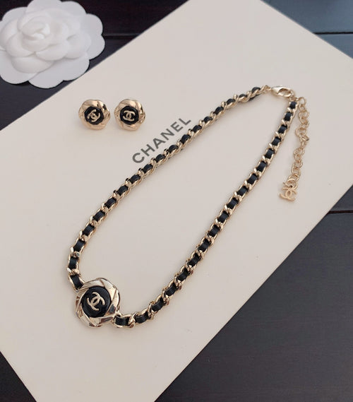 Gold-tone chain necklace with CC medallion and hanging chain ends