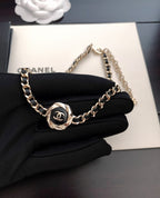Gold-tone chain necklace with CC medallion charm on black fabric