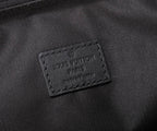 Louis Vuitton logo patch on textured black lining fabric