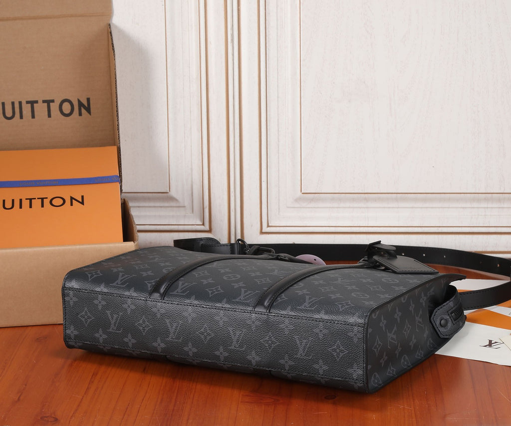 Black Louis Vuitton monogram duffel-style bag with top handles and side strap