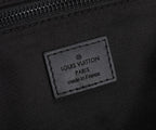Louis Vuitton Paris made in France leather patch on black fabric