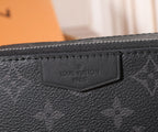 Louis Vuitton logo patch on black textured leather bag