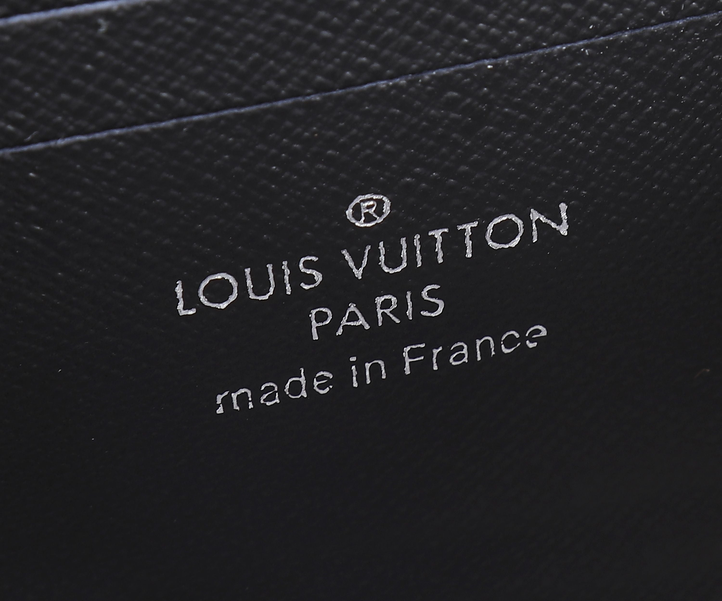 Louis Vuitton Paris made in France logo on black leather