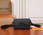 Louis Vuitton monogram crossbody bag with flap, chain detail, and black leather strap