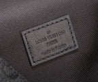 Louis Vuitton Paris logo leather patch on black textured crossbody bag interior