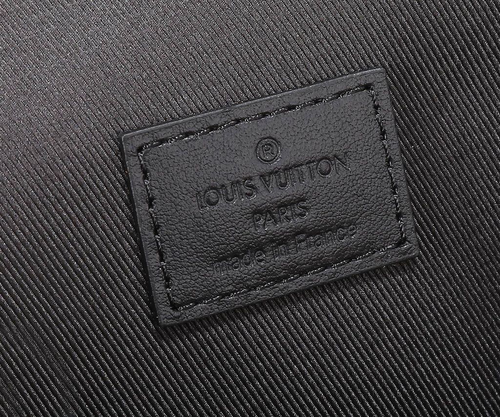 Louis Vuitton bag logo patch on textured lining with embossed brand mark