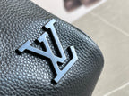 Louis Vuitton LV logo patch on dark blue textured leather duffel