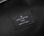 Louis Vuitton made in France logo patch on black leather bag