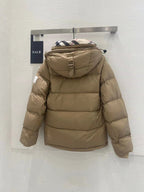 Beige puffer jacket with attached hood and quilted back
