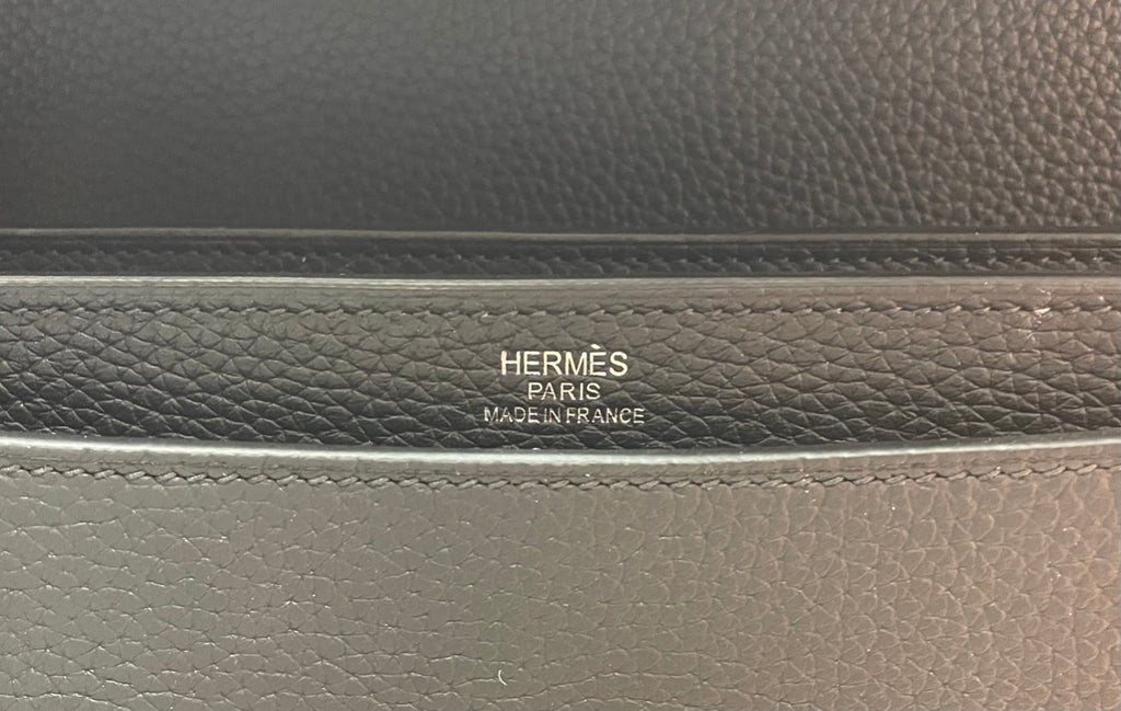 Embossed interior label on Hermes bag: Paris and Made in France