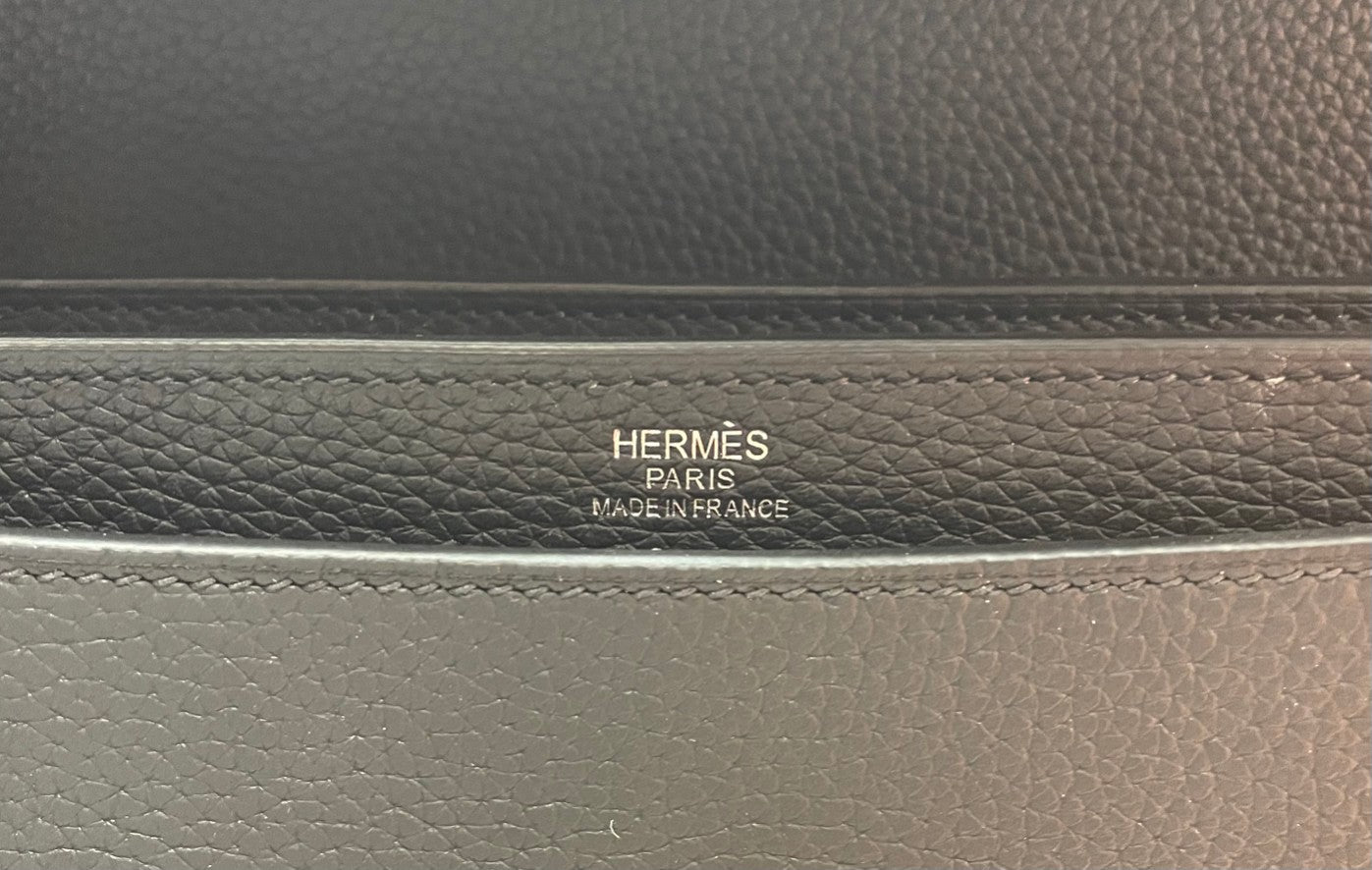 Embossed interior label on Hermes bag: Paris and Made in France