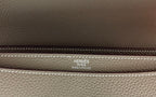 Hermes Paris logo stitched on taupe leather briefcase flap trim
