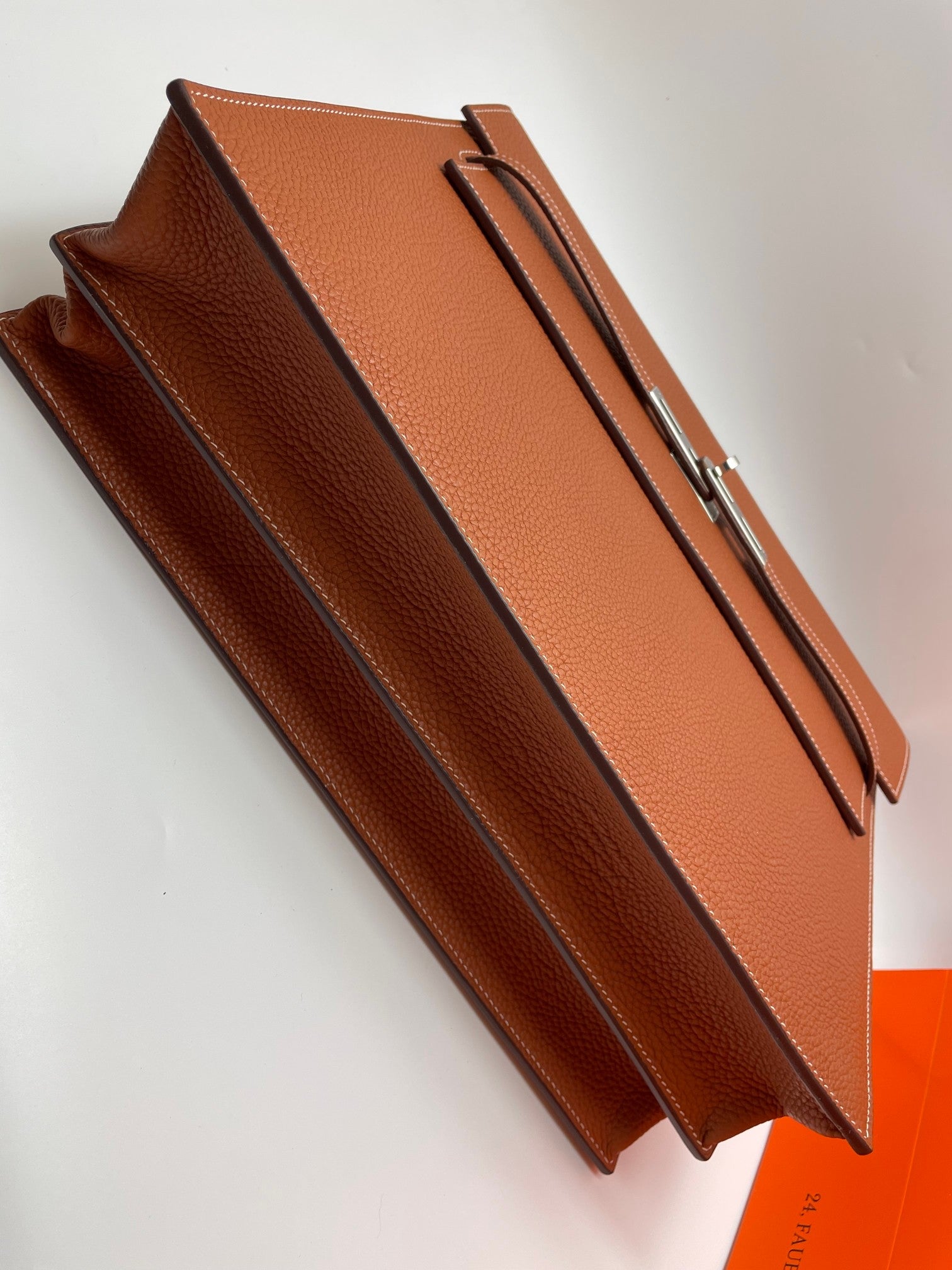 Hermes brown leather briefcase open side view with interior panel and handle bar