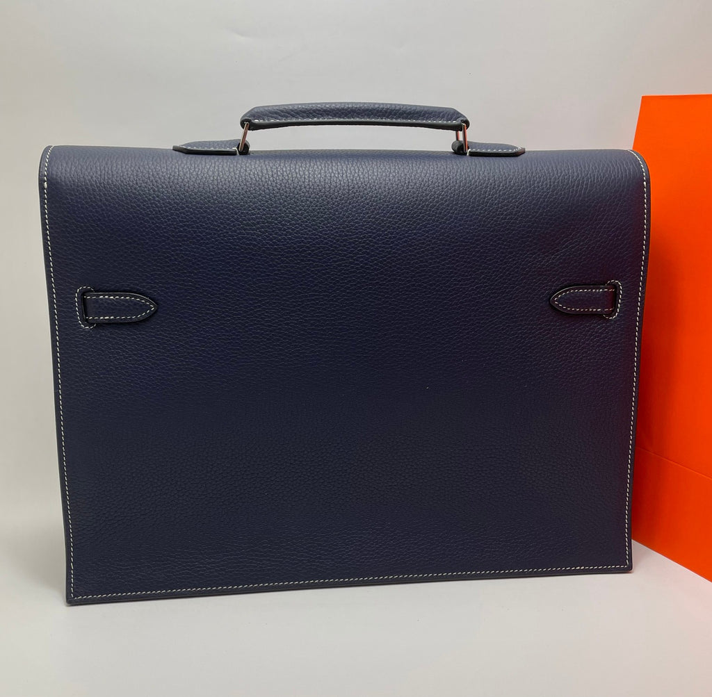 Hermes dark blue leather briefcase with top handle and back strap details