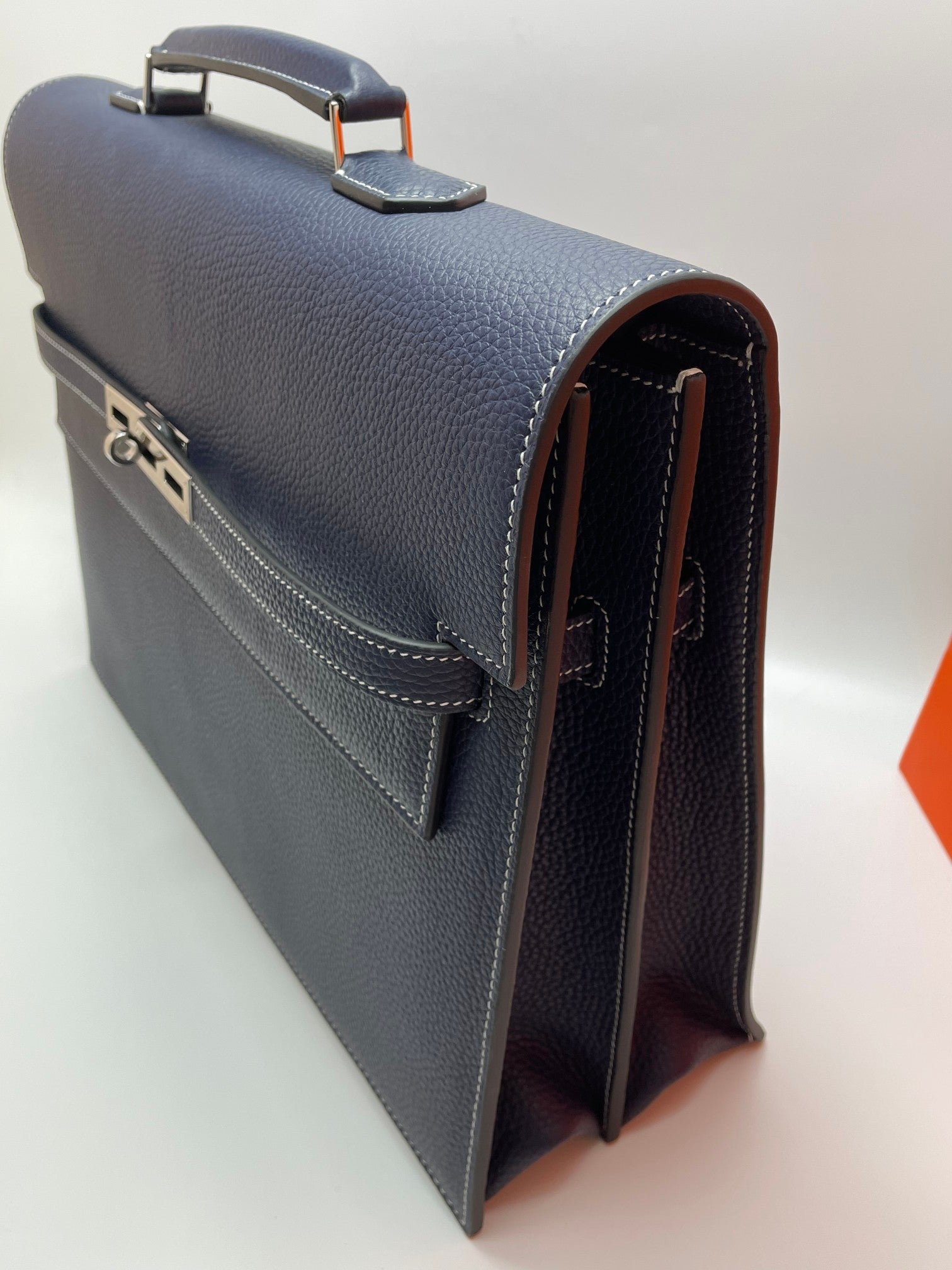 Hermes blue leather briefcase with top handle and open side compartment