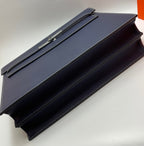 Hermes navy leather briefcase with long strap and gold-tone hardware