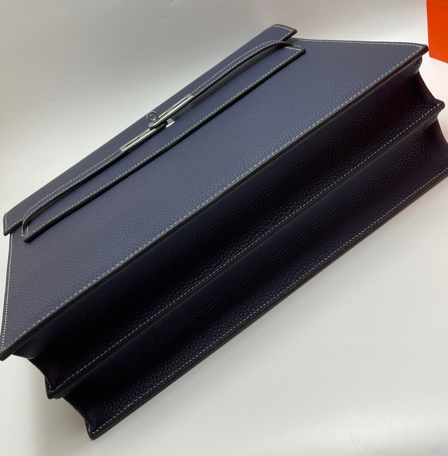 Hermes navy leather briefcase with long strap and gold-tone hardware