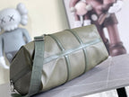 Men's Louis Vuitton duffel bag, olive green leather with front pocket and shoulder strap