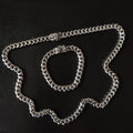 Silver chain necklace with floral bead accents, chunky link design