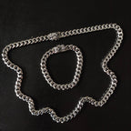 Silver chain necklace with floral bead accents, chunky link design
