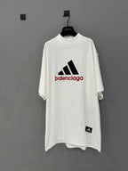 White short-sleeve T-shirt with Balenciaga logo front and crew neck