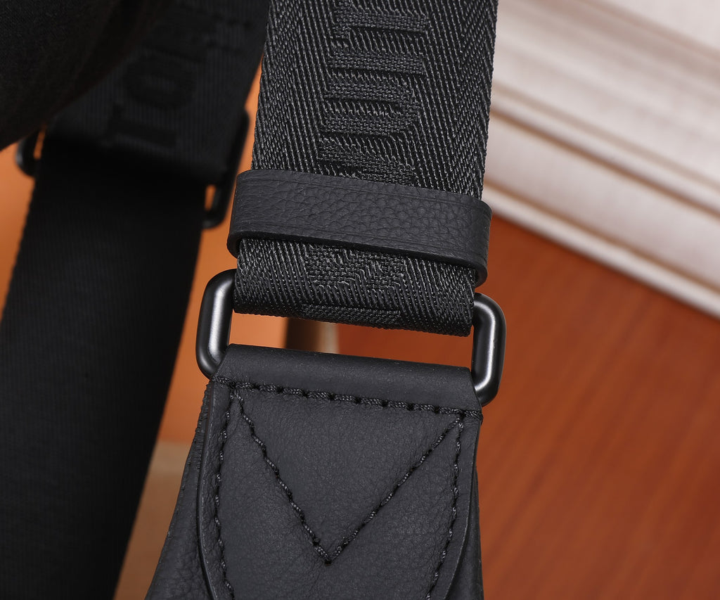 Louis Vuitton men's sling bag strap with black webbing and metal buckle attachment