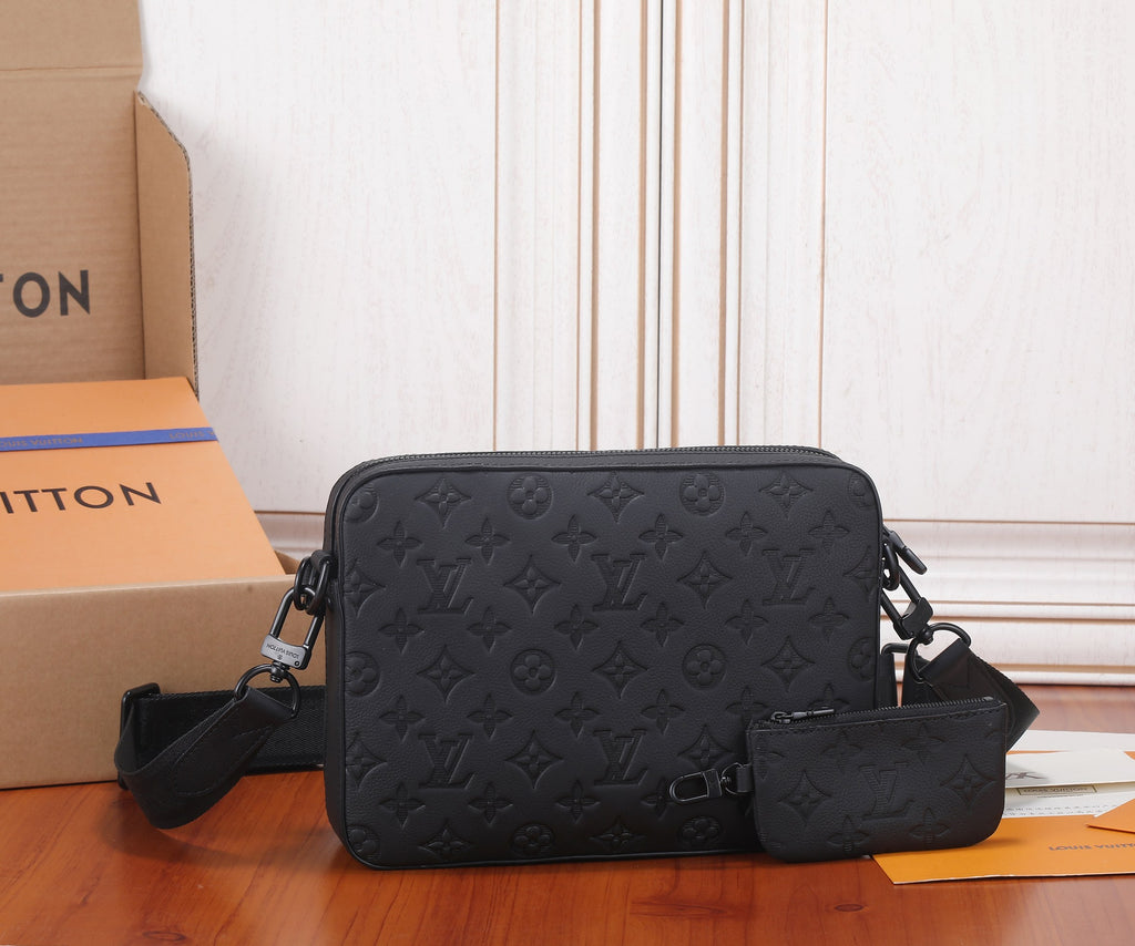 Men's crossbody bag with black embossed monogram, zip closure, detachable pouch