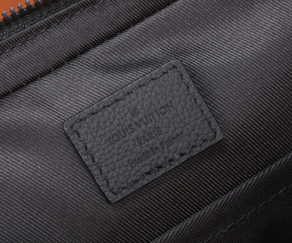 Interior card holder label pocket in black fabric inside crossbody bag
