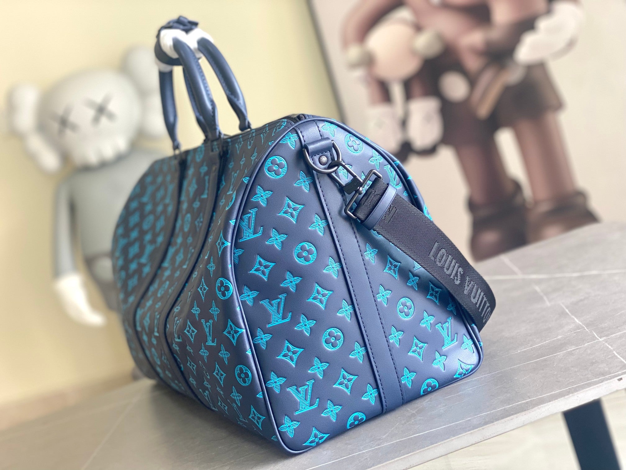 Louis Vuitton men’s duffel bag, blue monogram print, top handles and shoulder strap