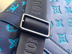 Louis Vuitton duffel bag leather strap with rectangular silver buckle and blue stitching