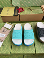 Gucci logo slide sandals, light blue straps with white cushioned footbed