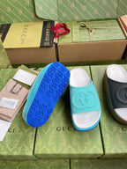 Gucci logo slide sandals, one pair blue straps and white footbed