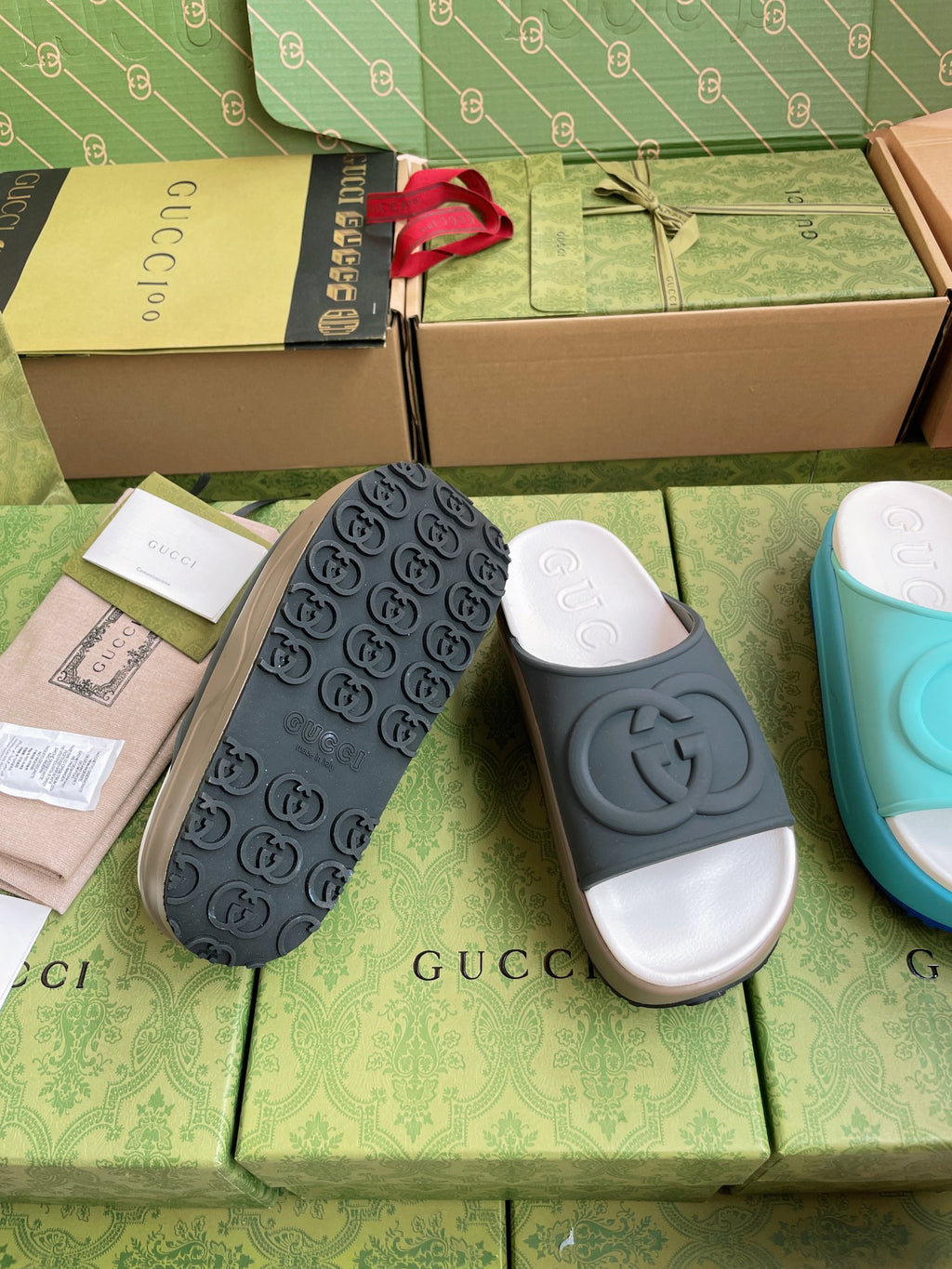 Gucci logo slide sandals, dark gray straps with white footbed