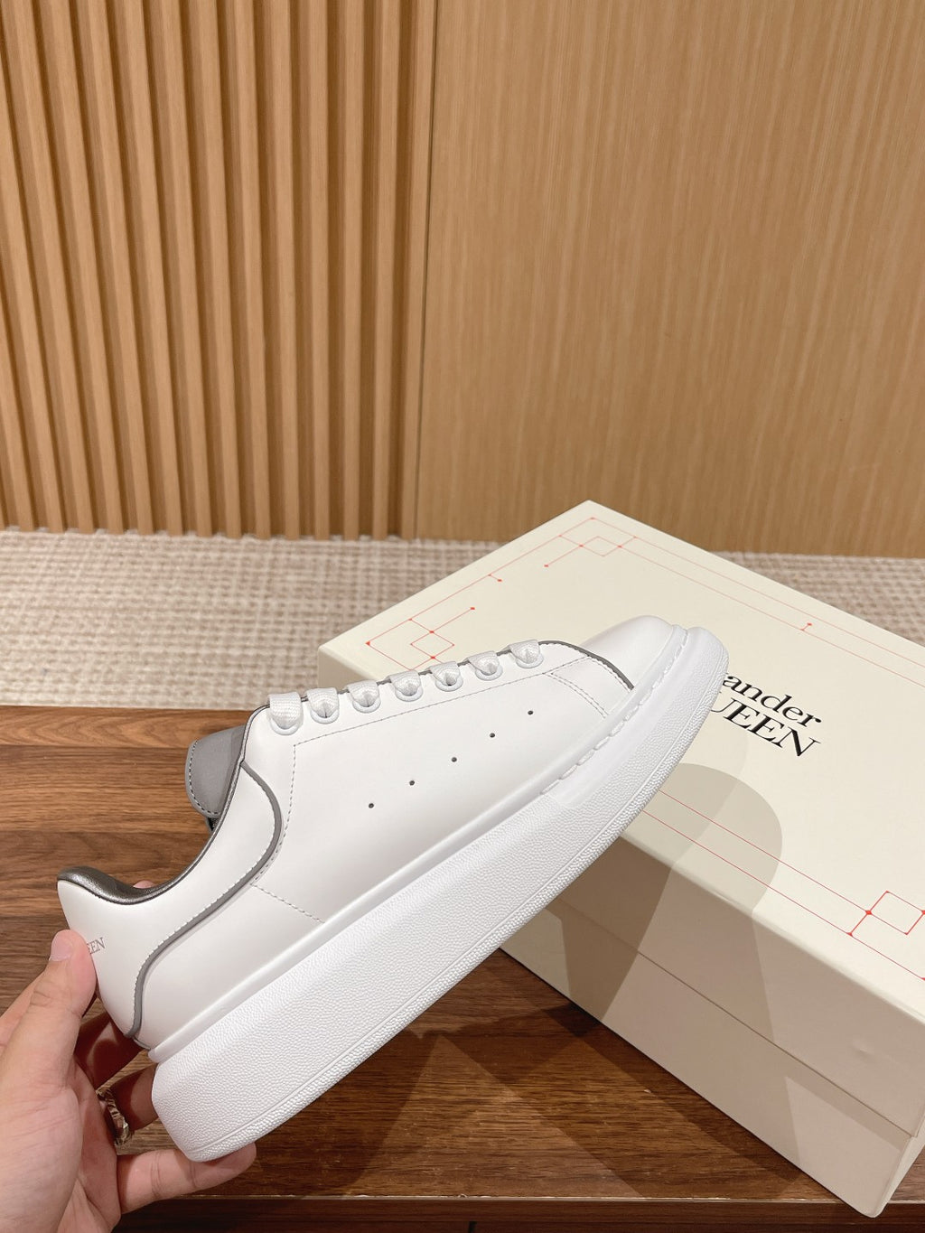 White leather sneakers with gray heel and laces, Alexander McQueen