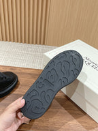 Black rubber outsole with patterned tread for grip