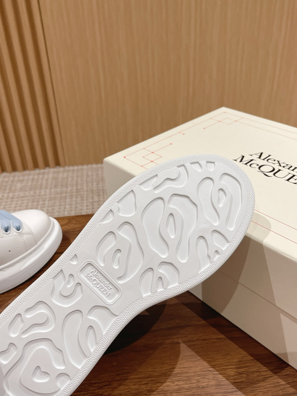 Rubber outsole of Alexander McQueen sneakers with textured pattern and molded tread
