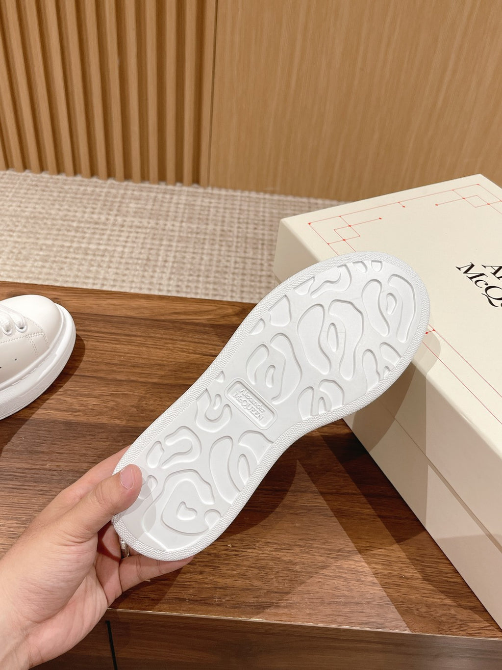 White rubber sneaker outsole with textured tread pattern