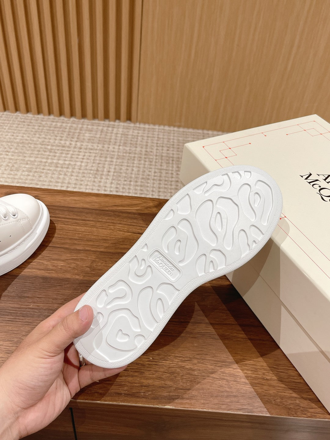 White rubber sneaker outsole with textured tread pattern