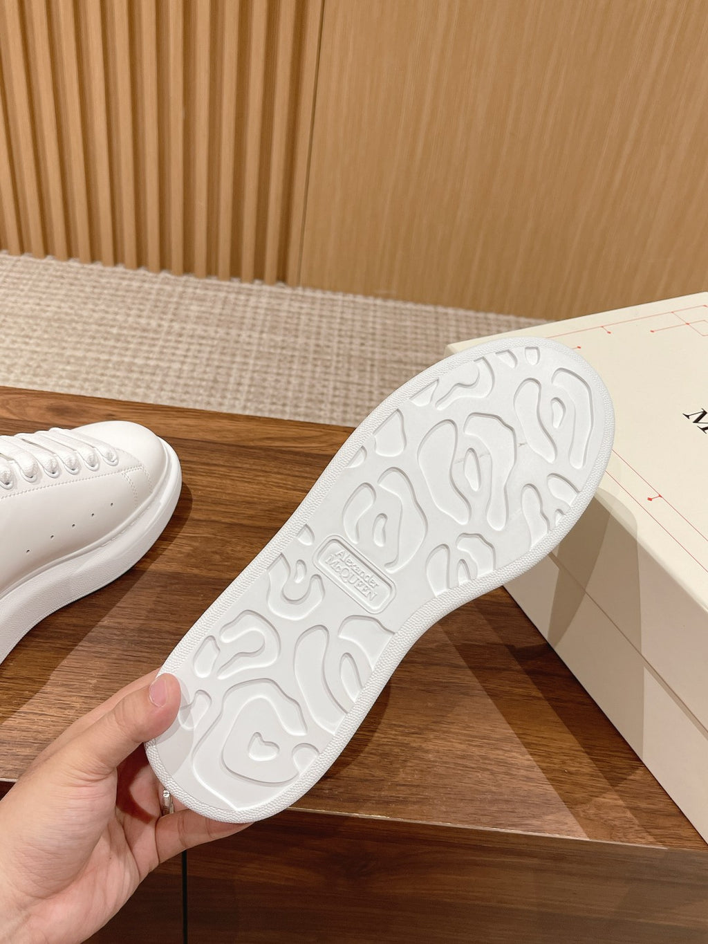 White rubber sneaker outsole with textured tread pattern