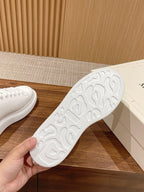 White rubber sneaker outsole with textured tread pattern