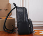 Louis Vuitton monogram backpack with front zip panel, side handle, and strap