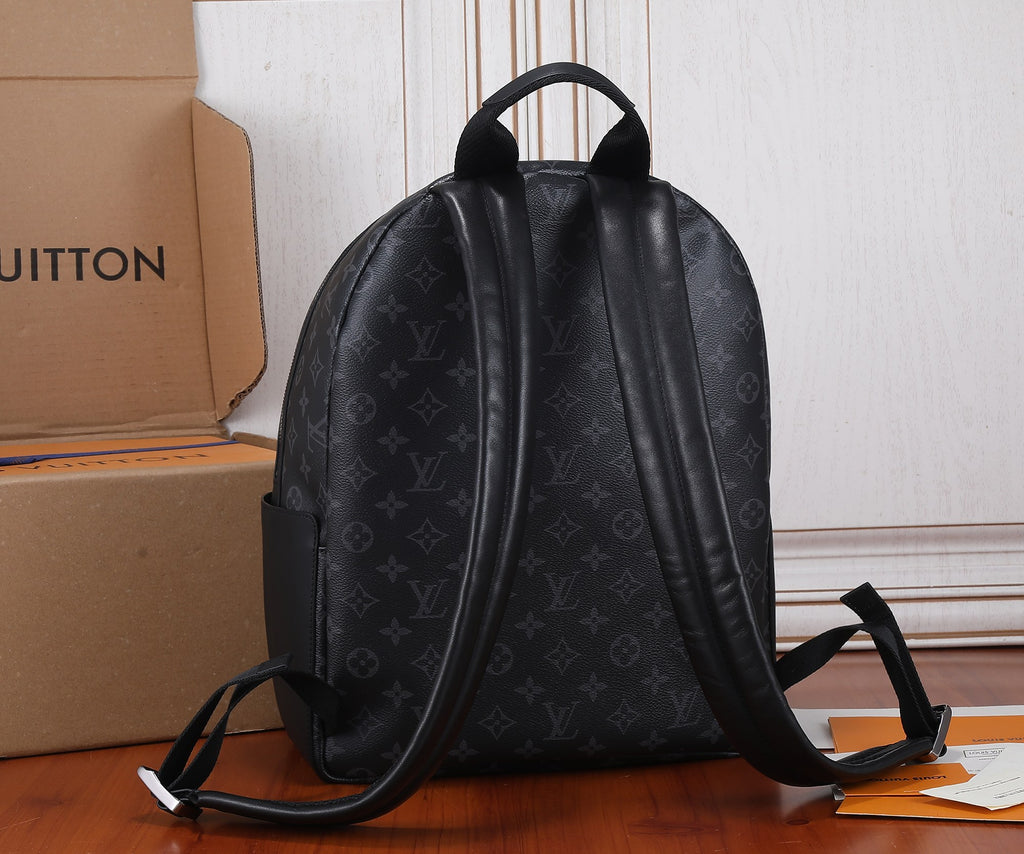 Louis Vuitton monogram black backpack with wide opening and adjustable shoulder straps