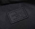 Louis Vuitton Paris leather label with made-in text on fabric backing