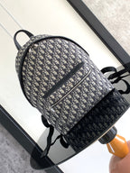 Men's Dior jacquard backpack with blue Dior pattern, black trim, top zip
