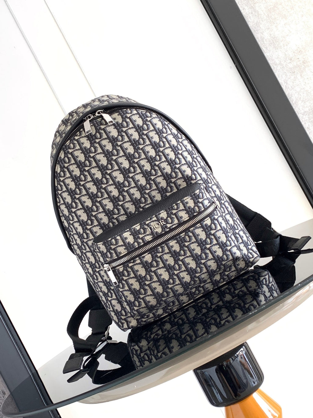 Dior men mini backpack in dark blue and beige monogram canvas with black trim