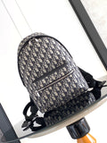 Dior men mini backpack in dark blue and beige monogram canvas with black trim