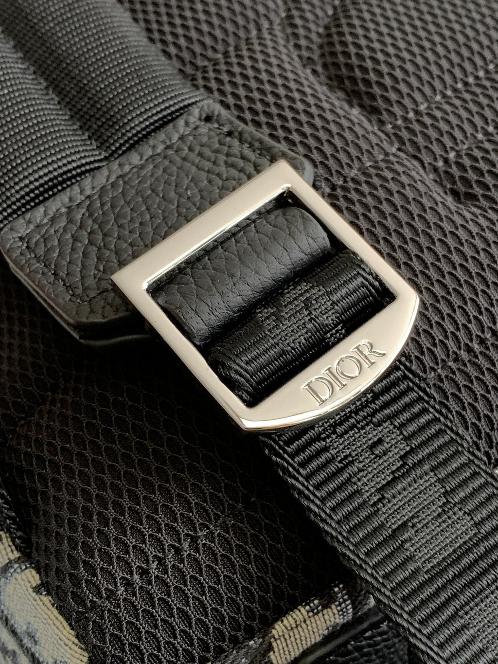 Dior men backpack black leather logo patch on adjustable webbing strap