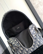 Dior men backpack open top with black fabric lining and monogram canvas exterior