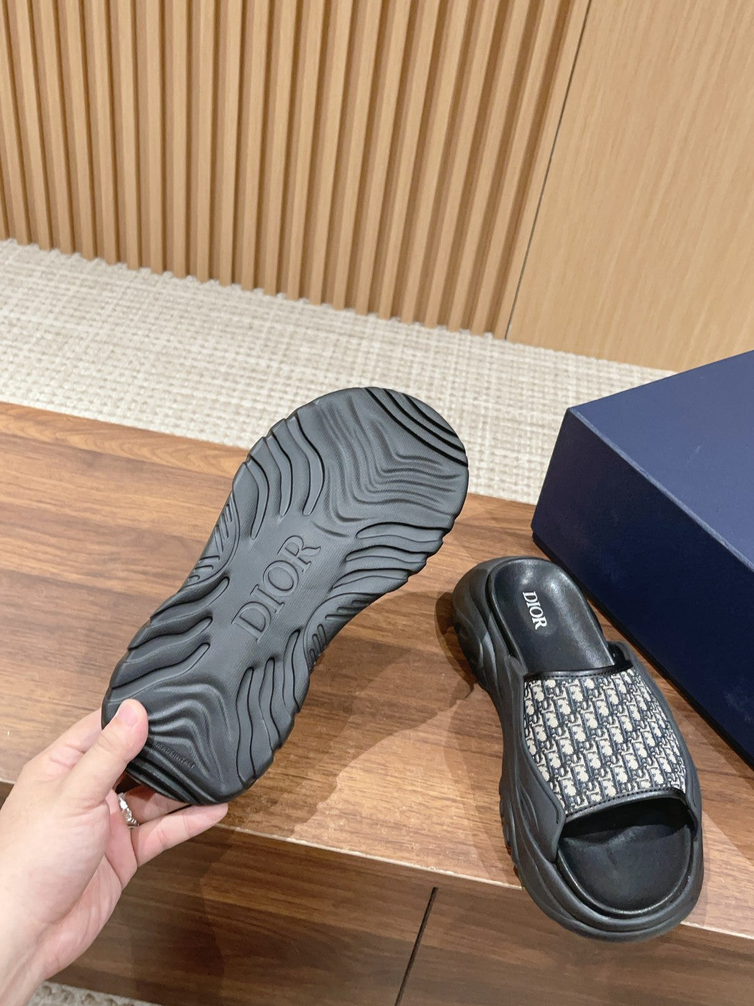 Dior monogram slide sandal outsole, textured tread sole with black upper
