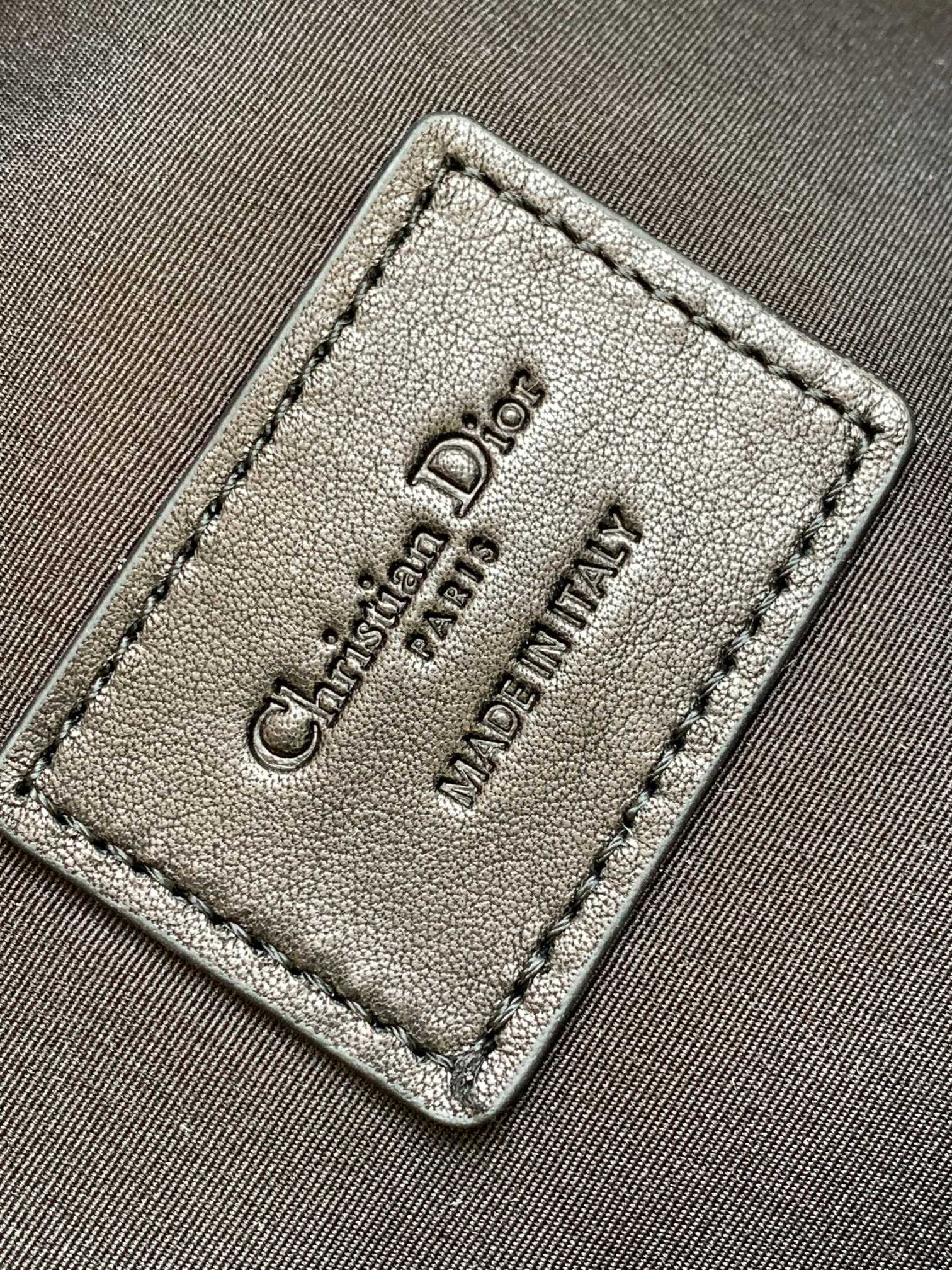 Dior logo leather inside tag on fabric lining